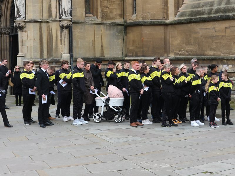 Members of Downend Boxing Club lined up outside Bristol Cathedral as Jude Moore's body arrived.