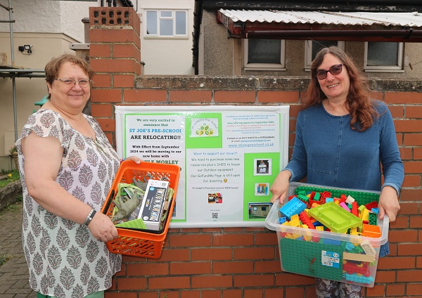 St Joseph's Pre-school 1-to-1 support worker Jacky Addicott and manager Cathy Williamson with toys boxed up ready for the move